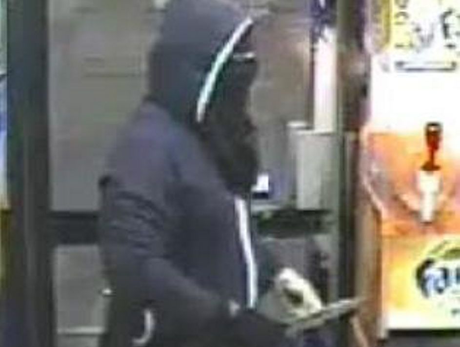 CCTV image of a man who used a knife to hold up the United Service Station on West St, Toowoomba, on December 7. CCTV image of a man who used a knife to hold up the United Service Station on West St, Toowoomba, on December 7.
