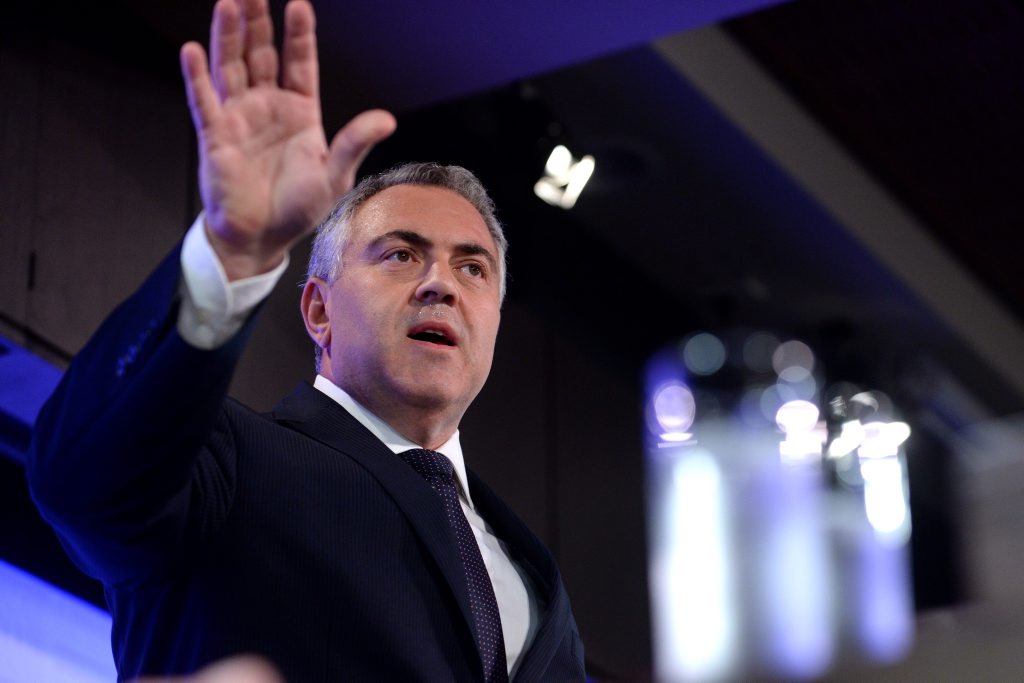 Federal Treasurer Joe Hockey speaking at the National Press Club in Canberra, Tuesday, Dec. 17, 2013. Mr Hockey spoke on the Mid Year Economic and Fiscal Outlook. (AAP Image/Alan Porritt) NO ARCHIVING Federal Treasurer Joe Hockey speaking at the National Press Club in Canberra, Tuesday, Dec. 17, 2013. Mr Hockey spoke on the Mid Year Economic and Fiscal Outlook. (AAP Image/Alan Porritt) NO ARCHIVING