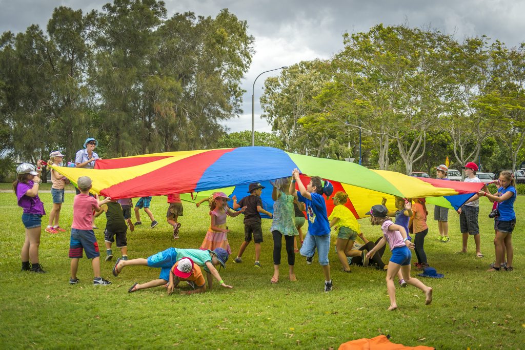 Kids enjoying the parachute during the PCYC Teddy Bear Picnic held at the Gladstone Marina, Gladstone. Kids enjoying the parachute during the PCYC Teddy Bear Picnic held at the Gladstone Marina, Gladstone.