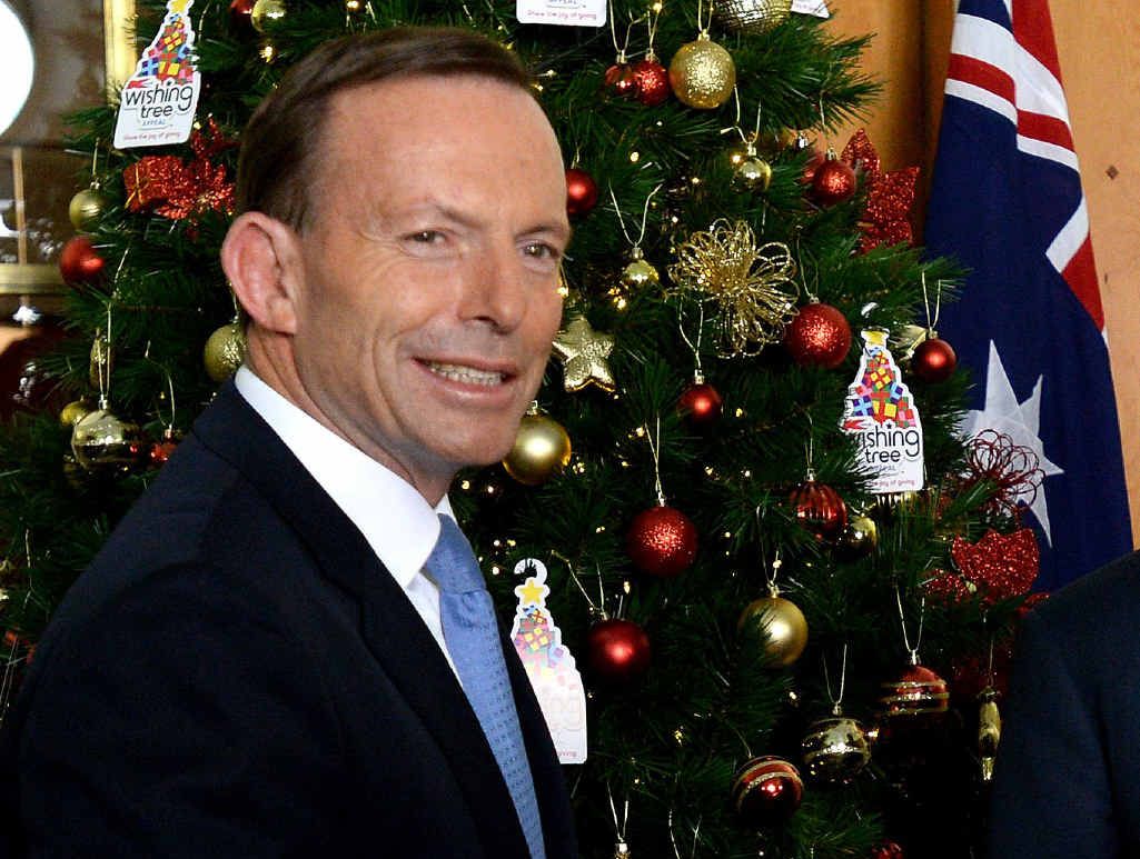 MOOD SWING: Tony Abbott needs to swap blue for yellow ties. MOOD SWING: Tony Abbott needs to swap blue for yellow ties.