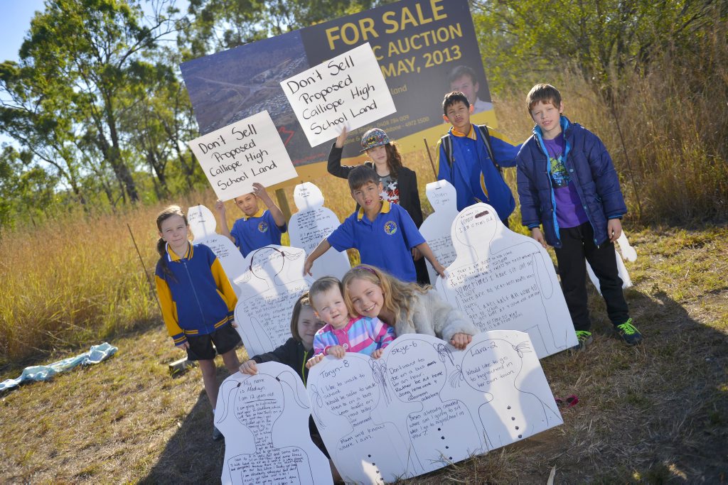 Potential Calliope students gather on the proposed Calliope high school site to protest its sale. Potential Calliope students gather on the proposed Calliope high school site to protest its sale.