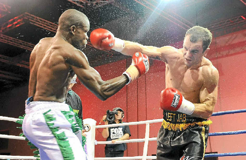 Jarrod Fletcher, pictured (right) fighting Philip Kotey, will have his first world title bout in February. Jarrod Fletcher, pictured (right) fighting Philip Kotey, will have his first world title bout in February.