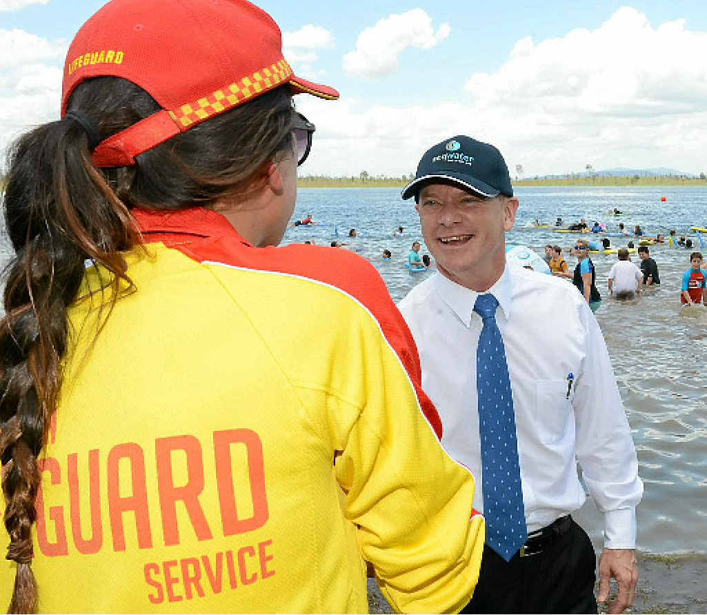 IN GOOD HANDS: The Premier meets a lifeguard. IN GOOD HANDS: The Premier meets a lifeguard.