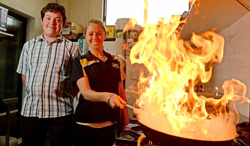 Nathanial Leigh and Kirra Sports Club chef April Brady. Photo: Blainey Woodham Nathanial Leigh and Kirra Sports Club chef April Brady. Photo: Blainey Woodham