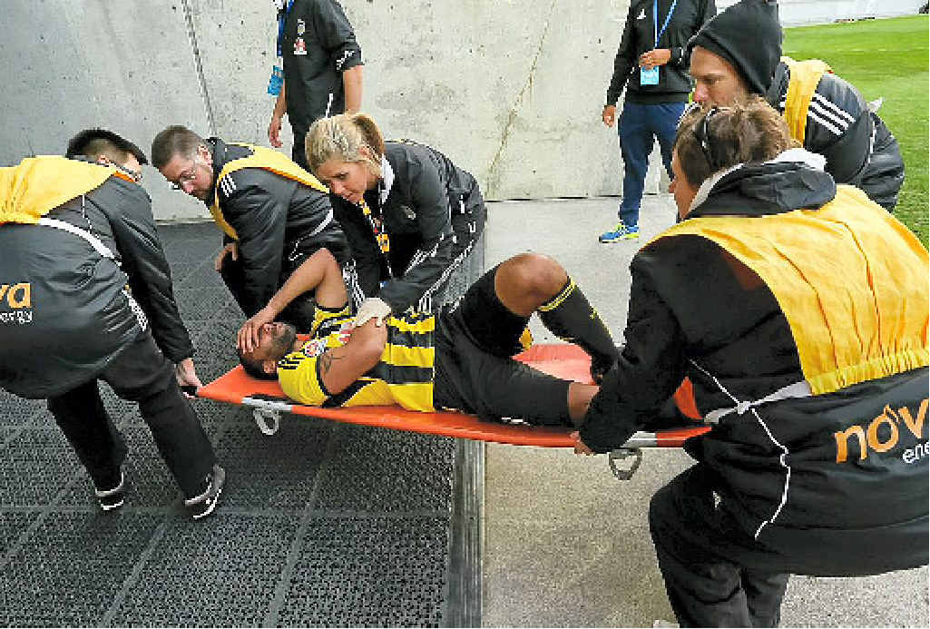 DOWN AND OUT: Paul Ifill is stretchered from the field against Sydney FC. DOWN AND OUT: Paul Ifill is stretchered from the field against Sydney FC.