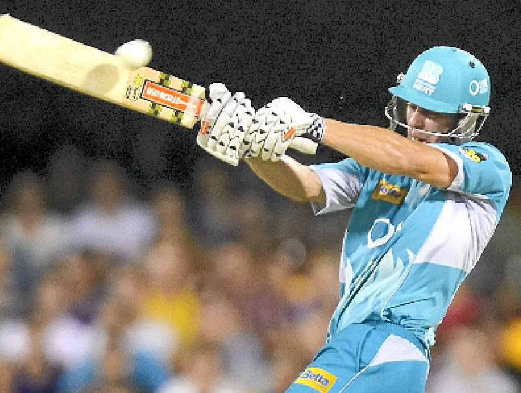 BIG HITTER: Chris Lynn of the Heat hits the ball over the boundary for a six against the Perth Scorchers on Sunday night at the Gabba. BIG HITTER: Chris Lynn of the Heat hits the ball over the boundary for a six against the Perth Scorchers on Sunday night at the Gabba.