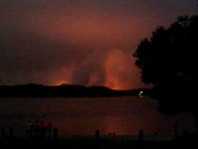 The fire north of Lennox Head looming over Lake Ainsworth. The fire north of Lennox Head looming over Lake Ainsworth.