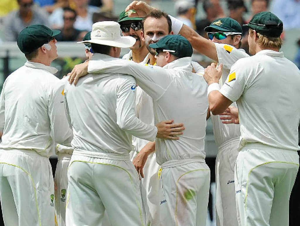 GOTCHA: Teammates congratulate Nathan Lyon after dismissing Ben Stokes on the third day of the Boxing Day Ashes Test at the MCG in Melbourne, yesterday. He snared five wickets. GOTCHA: Teammates congratulate Nathan Lyon after dismissing Ben Stokes on the third day of the Boxing Day Ashes Test at the MCG in Melbourne, yesterday. He snared five wickets.