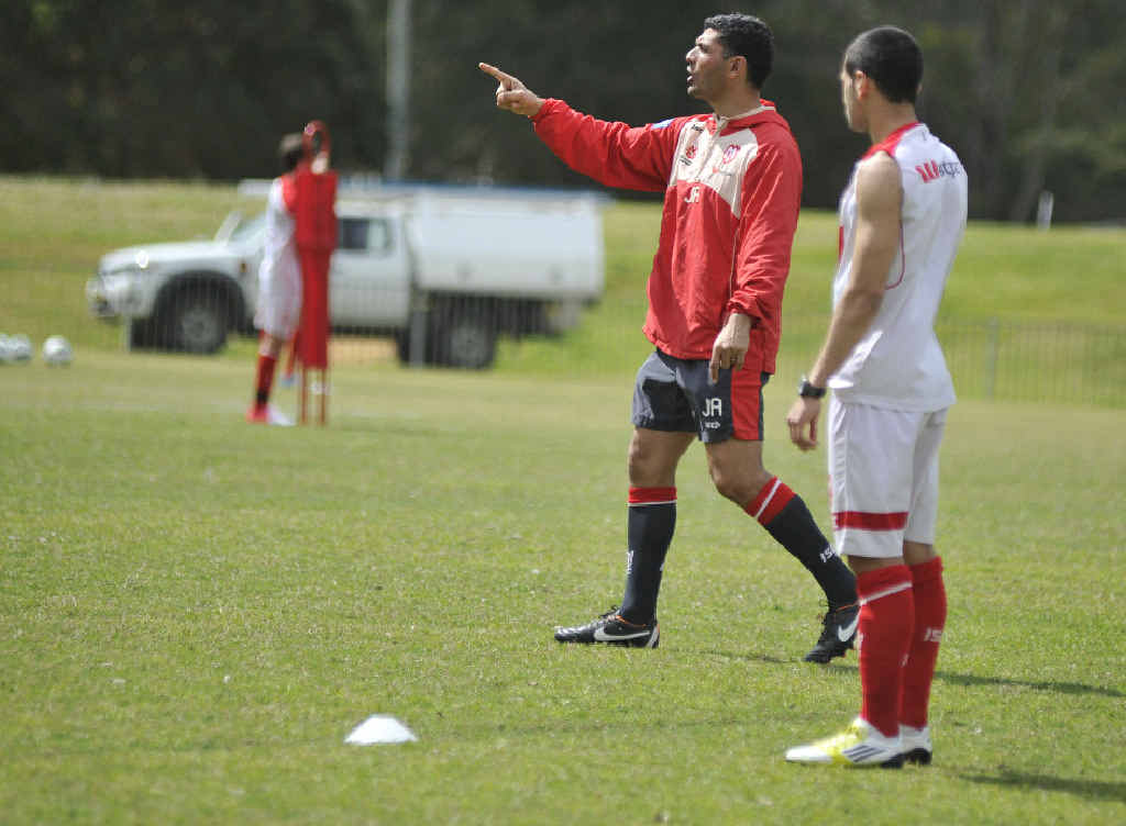 SACKING: John Aloisi with the Melbourne Heart squad. SACKING: John Aloisi with the Melbourne Heart squad.