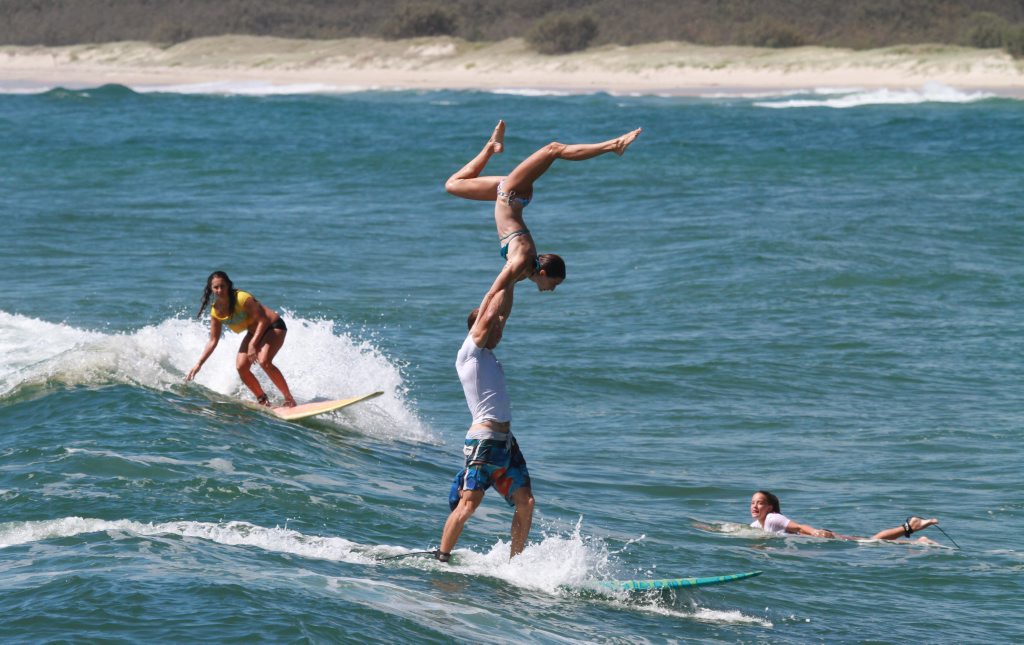 Caloundra's Fred and Lily Branger, originally from France, are well-known for their love of tandem surfing. Photo: Brett Wortman Caloundra's Fred and Lily Branger, originally from France, are well-known for their love of tandem surfing. Photo: Brett Wortman