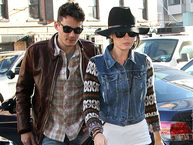 Rock couple John Mayer and Katy Perry are acting like a married couple, according to friends. Rock couple John Mayer and Katy Perry are acting like a married couple, according to friends.