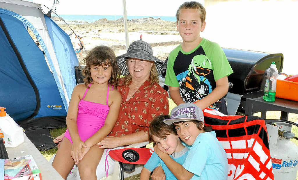 Roz Woods has been holidaying at Brooms Head for 45 years and continues the practice with her grandchildren Chantelle, Bailey, Mason and Ryley. Photo Debrah Novak Roz Woods has been holidaying at Brooms Head for 45 years and continues the practice with her grandchildren Chantelle, Bailey, Mason and Ryley. Photo Debrah Novak