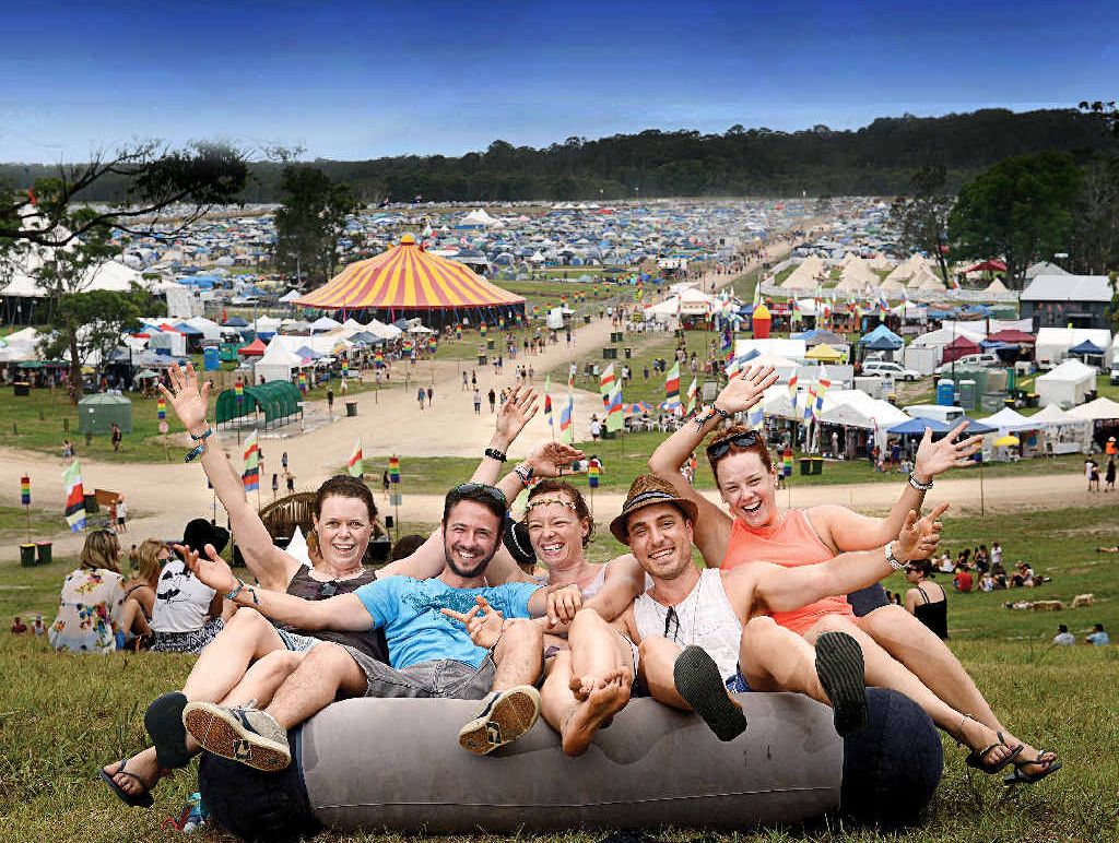 SITTING PRETTY: Cross, Carm Fedele, C.J Mason, Mark Ragusa and Lauren Kontus bringing in the New Year at the Falls Festival at Yelgun. SITTING PRETTY: Cross, Carm Fedele, C.J Mason, Mark Ragusa and Lauren Kontus bringing in the New Year at the Falls Festival at Yelgun.