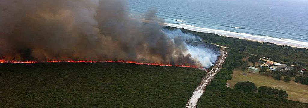 FROM THE AIR: The view from the T&G; helicopter involved in water bombing Lennox Head. FROM THE AIR: The view from the T&G; helicopter involved in water bombing Lennox Head.