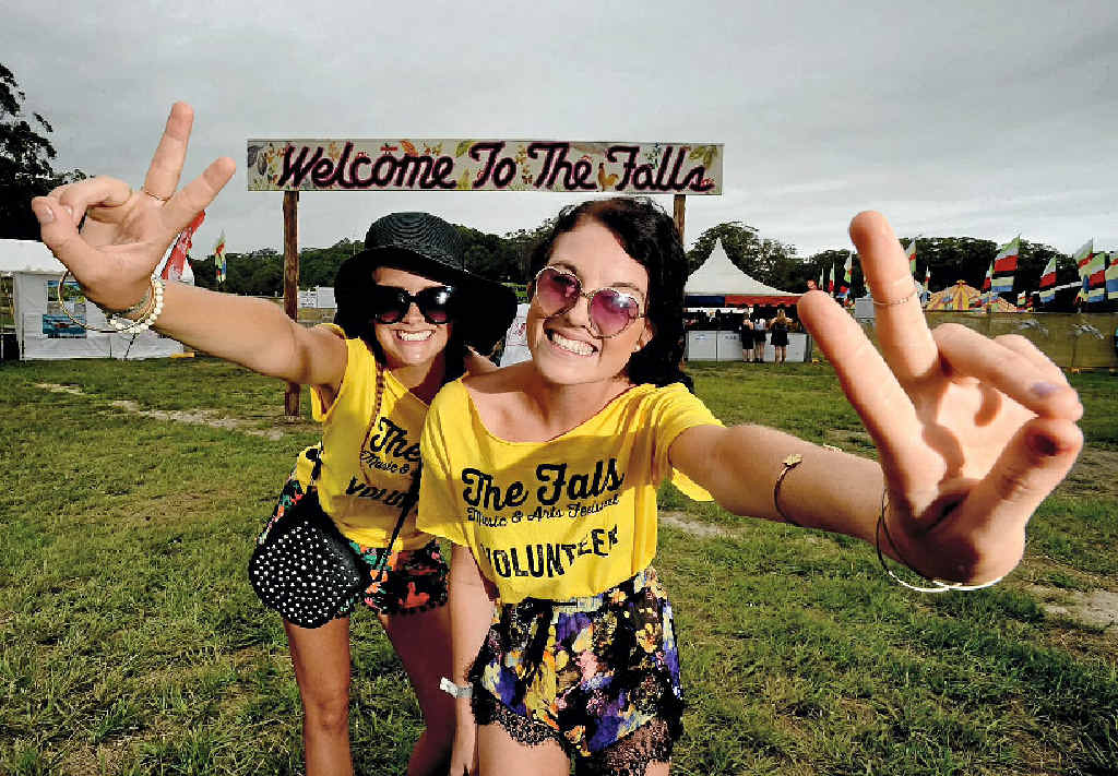 WELCOME: Festival volunteers Amelia Dlask, of Ocean Shores, and Amber Booler, of the Gold Coast, pictured meeting and greeting at The Falls Festival main entrance. WELCOME: Festival volunteers Amelia Dlask, of Ocean Shores, and Amber Booler, of the Gold Coast, pictured meeting and greeting at The Falls Festival main entrance.