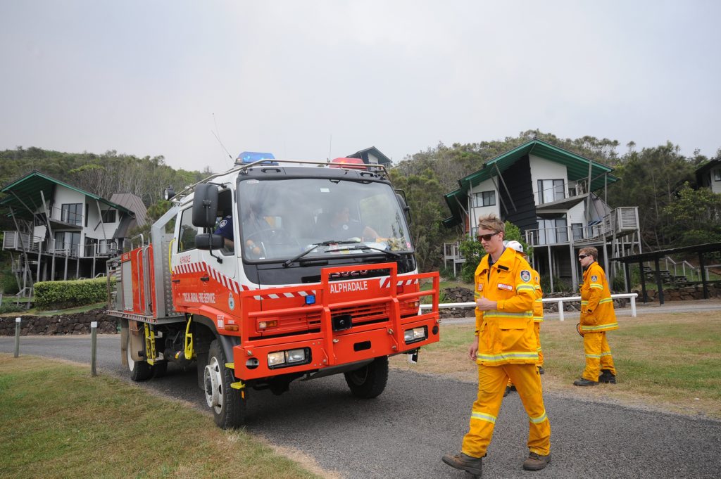 RFS protect the Linneaus Esate, at the Fires at Lennox Head on Monday. Photo Doug Eaton / The Northern Star RFS protect the Linneaus Esate, at the Fires at Lennox Head on Monday. Photo Doug Eaton / The Northern Star
