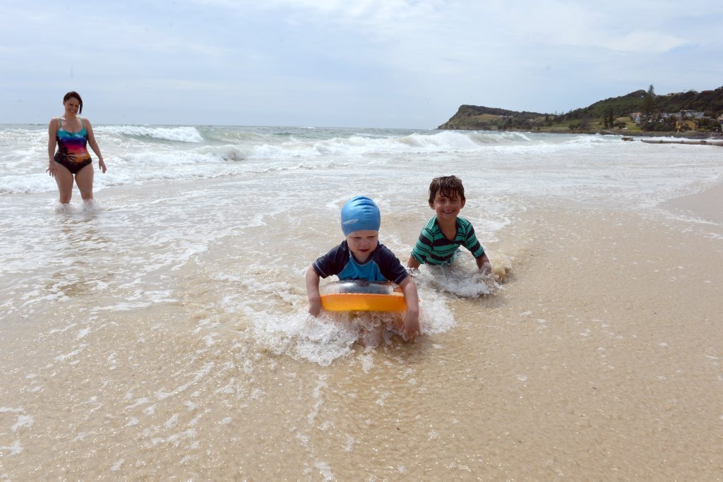 Three year old Rory Doherty from the Gold Coast and six year old Xavier Prescott from Perth make the most of the high tide at Lennox Head. Three year old Rory Doherty from the Gold Coast and six year old Xavier Prescott from Perth make the most of the high tide at Lennox Head.