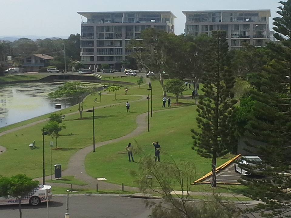 A man holding a knife to his chest at Nelson Park. A man holding a knife to his chest at Nelson Park.