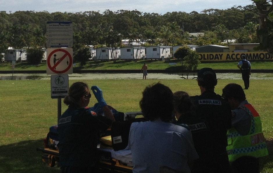 Police talk to a man at Nelson Park, Alexandra Headland. Police talk to a man at Nelson Park, Alexandra Headland.