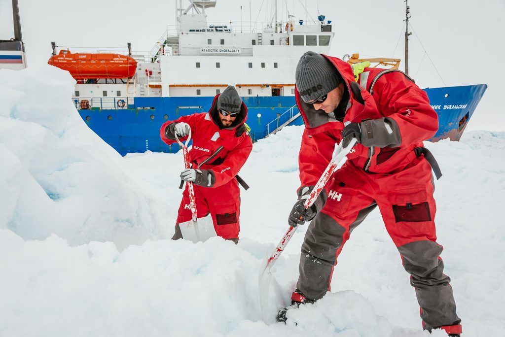cientists from the University of New South Wales in Australia, Ziggy Marzinellia and Graeme Clark, preparing a suitable surface for a helicopter landing next to the MV Akademik Shokalskiy. cientists from the University of New South Wales in Australia, Ziggy Marzinellia and Graeme Clark, preparing a suitable surface for a helicopter landing next to the MV Akademik Shokalskiy.