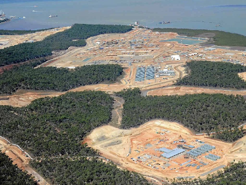 An aerial view of Curtis Island LNG sites being built. Bob Lamont says in about six months the 10,500-odd people employed on these projects will shrink to perhaps 1500 with the end of the construction phase. An aerial view of Curtis Island LNG sites being built. Bob Lamont says in about six months the 10,500-odd people employed on these projects will shrink to perhaps 1500 with the end of the construction phase.