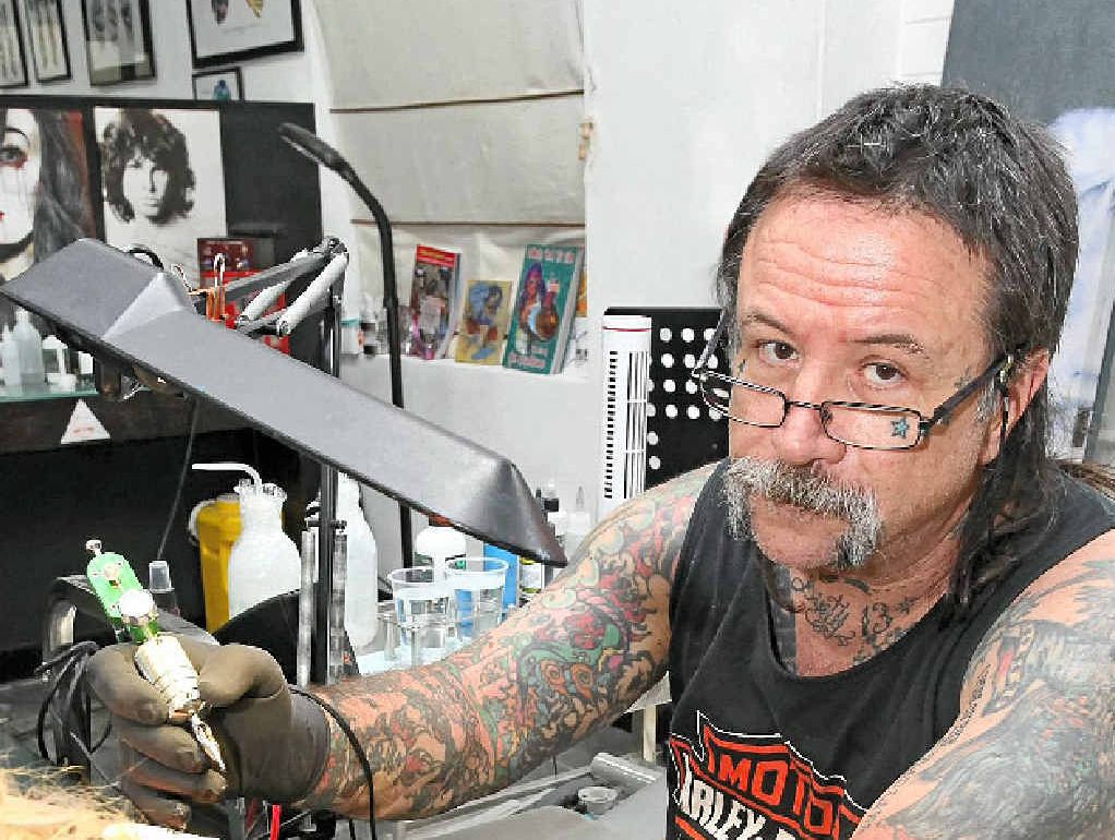 BAD FOR BUSINESS: Angelo Garozzo of Caloundra Tattoo Studios may have to close the doors on his business if the current VLAD laws stay in effect. BAD FOR BUSINESS: Angelo Garozzo of Caloundra Tattoo Studios may have to close the doors on his business if the current VLAD laws stay in effect.