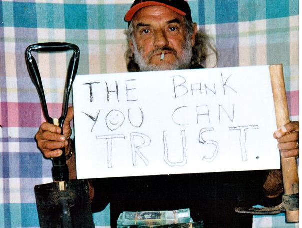 James O'Brien standing behind $3million in ill-gotten gains dug up from a dam on Falzon's property. O'Brien kept the photo in his truck. James O'Brien standing behind $3million in ill-gotten gains dug up from a dam on Falzon's property. O'Brien kept the photo in his truck.