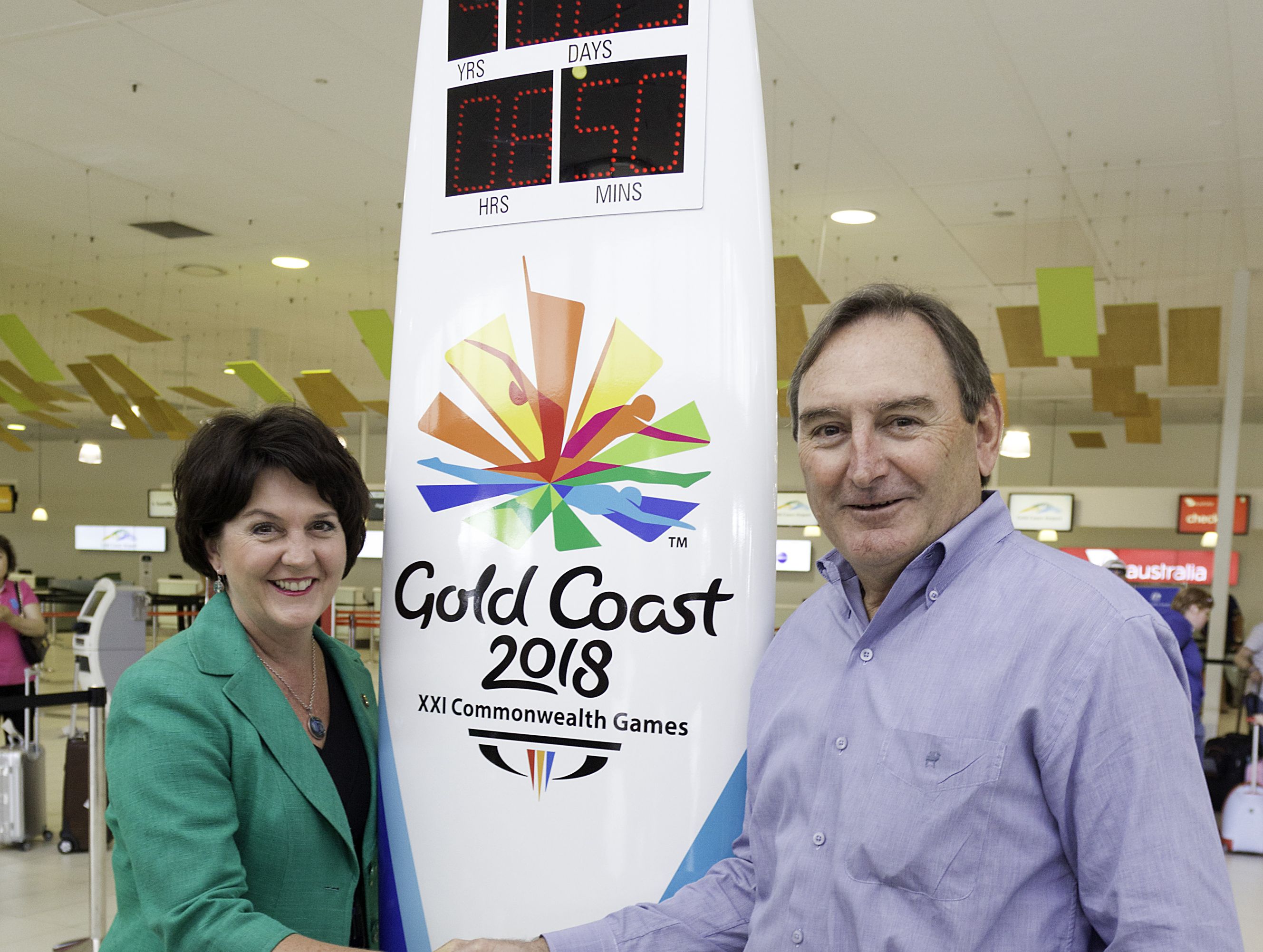 MP Jann Stuckey with CEO of the Gold Coast Airport Paul Donovan and the countdown clock. MP Jann Stuckey with CEO of the Gold Coast Airport Paul Donovan and the countdown clock.