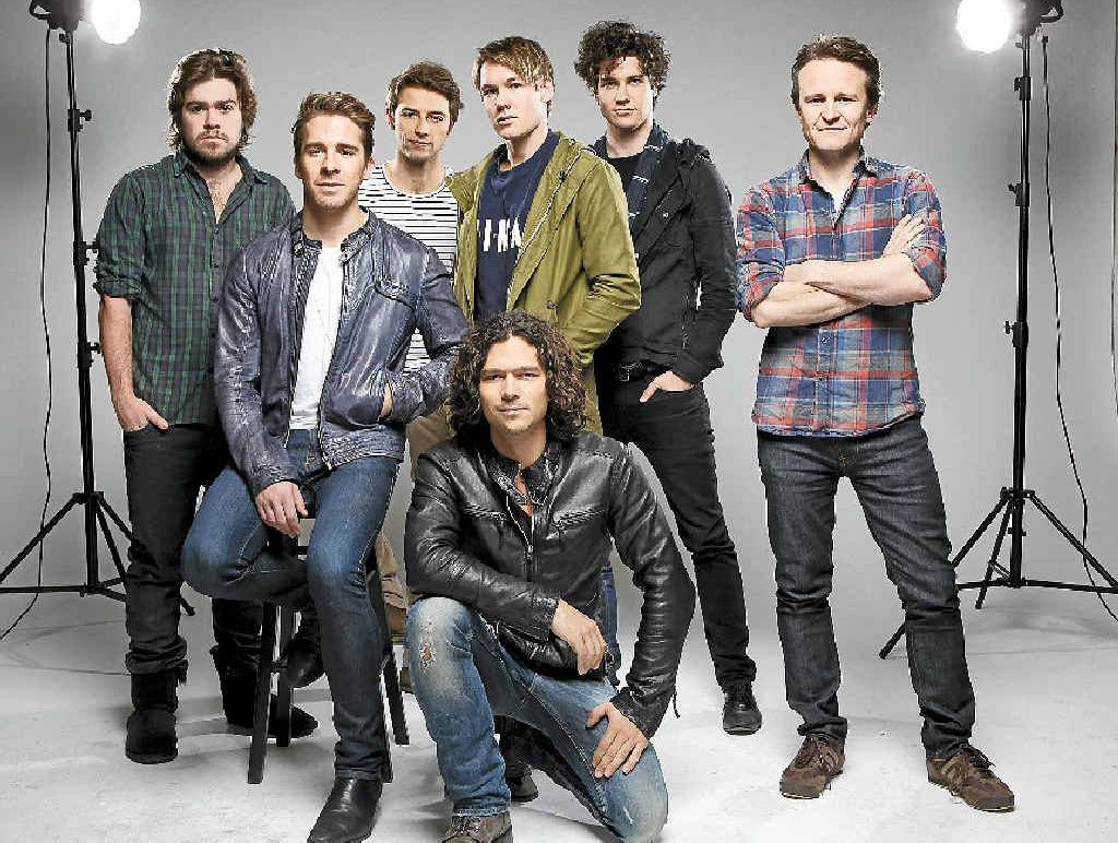 NEVER TEAR US APART: Stars of the new INXS telemovie (from left) Andy Ryan, Hugh Sheridan, Ido Drent, Luke Arnold (front), Alex Williams, Nicholas Masters and Damon Herriman. NEVER TEAR US APART: Stars of the new INXS telemovie (from left) Andy Ryan, Hugh Sheridan, Ido Drent, Luke Arnold (front), Alex Williams, Nicholas Masters and Damon Herriman.