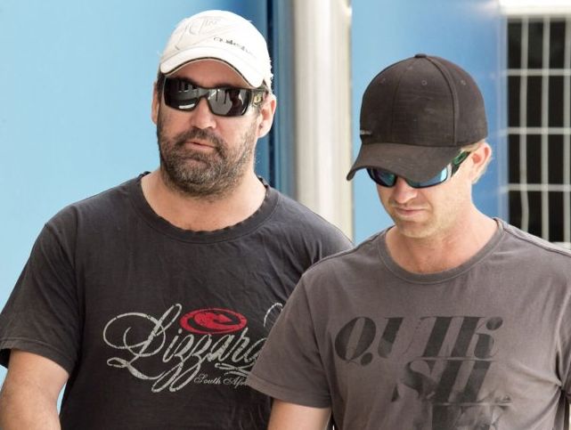 Brian Anthony Wust (left) with one of his supporters outside the Toowoomba Courthouse. Brian Anthony Wust (left) with one of his supporters outside the Toowoomba Courthouse.