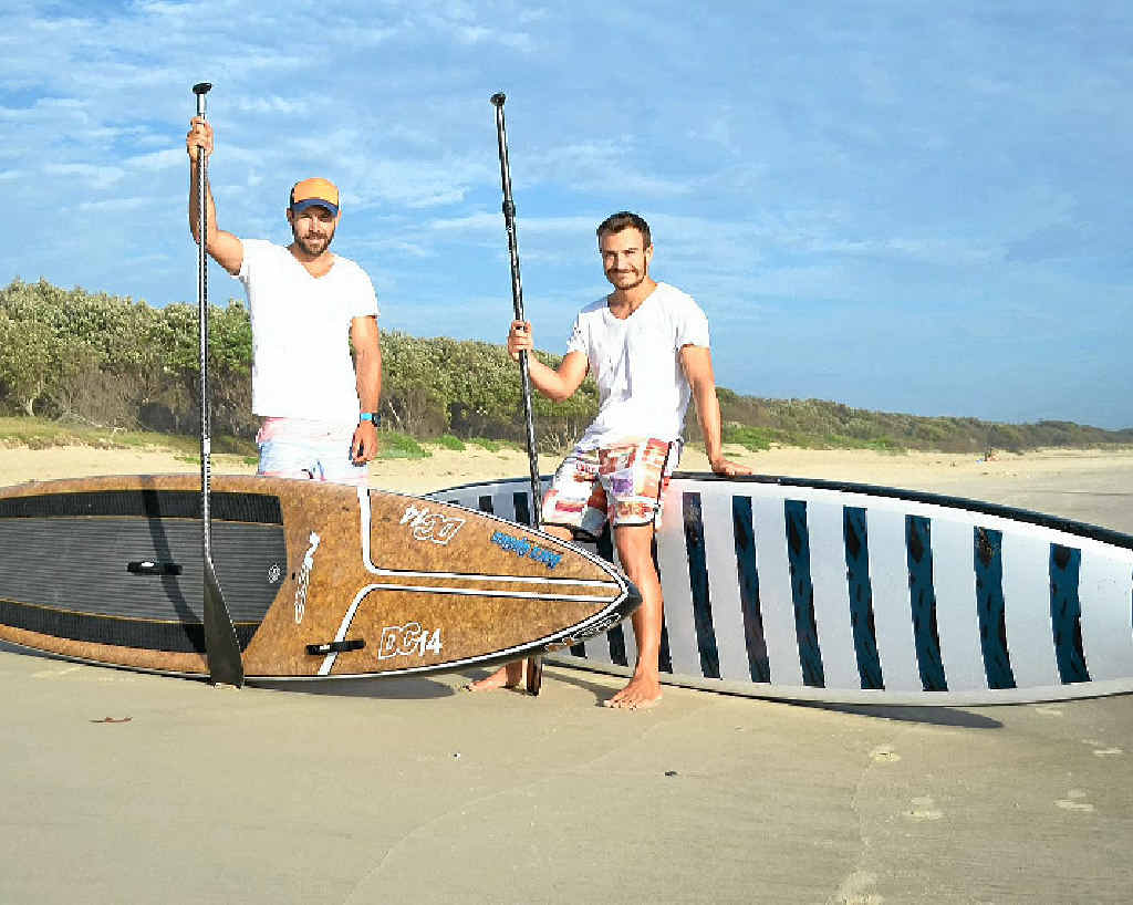 BLUE PADDLERS: Michael Leith and Tony Miller-Greenman prepare to leave Main Beach at Evans Head on their epic stand-up paddleboard ride from Brisbane to Sydney to raise money for Beyond Blue. BLUE PADDLERS: Michael Leith and Tony Miller-Greenman prepare to leave Main Beach at Evans Head on their epic stand-up paddleboard ride from Brisbane to Sydney to raise money for Beyond Blue.
