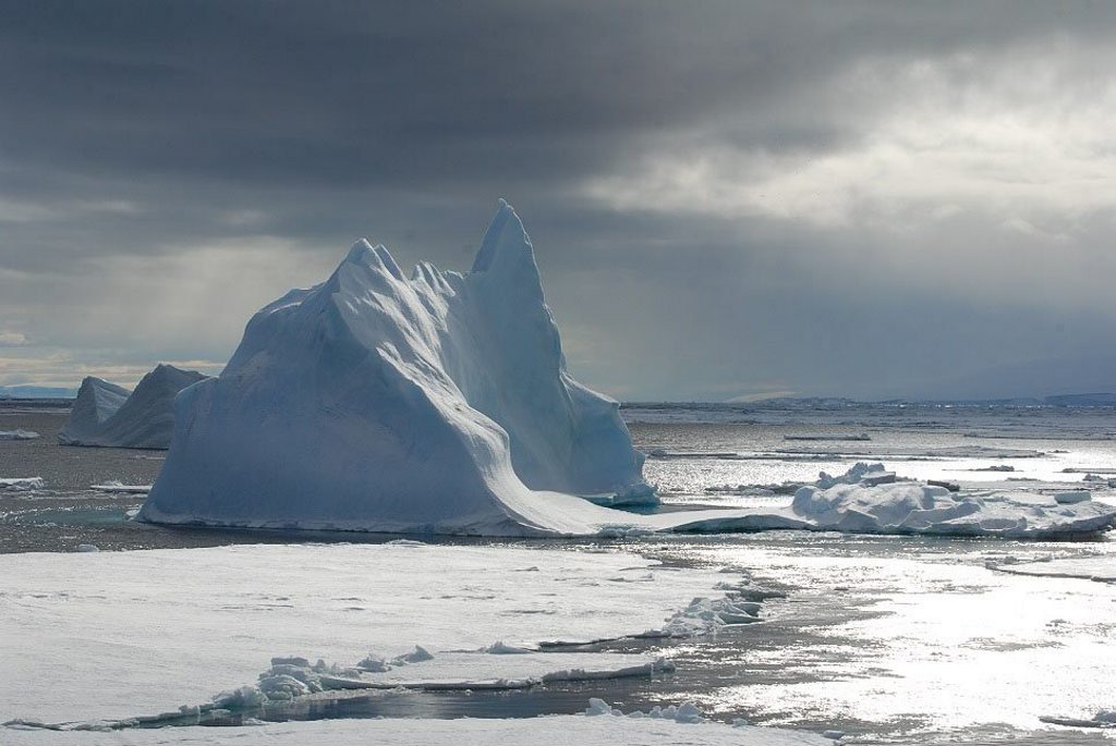 Icebergs as high as four storey buildings constantly glide by Antarctic expedition boats. Photo: Contributed (John Gardiner) Icebergs as high as four storey buildings constantly glide by Antarctic expedition boats. Photo: Contributed (John Gardiner)