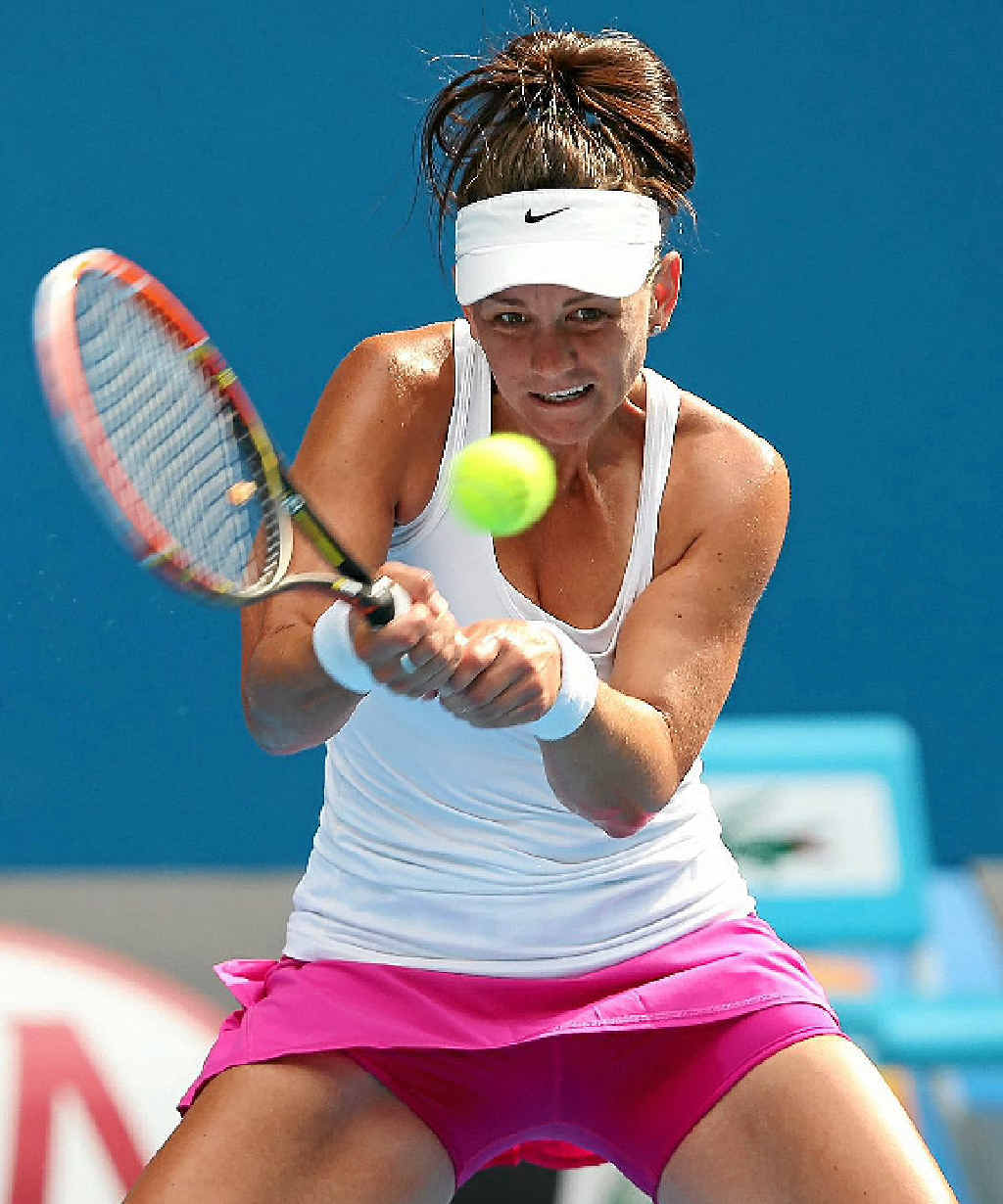 Casey Dellacqua drills a backhand return in the match against Kirsten Flipkens at the Australian Open yesterday. Casey Dellacqua drills a backhand return in the match against Kirsten Flipkens at the Australian Open yesterday.