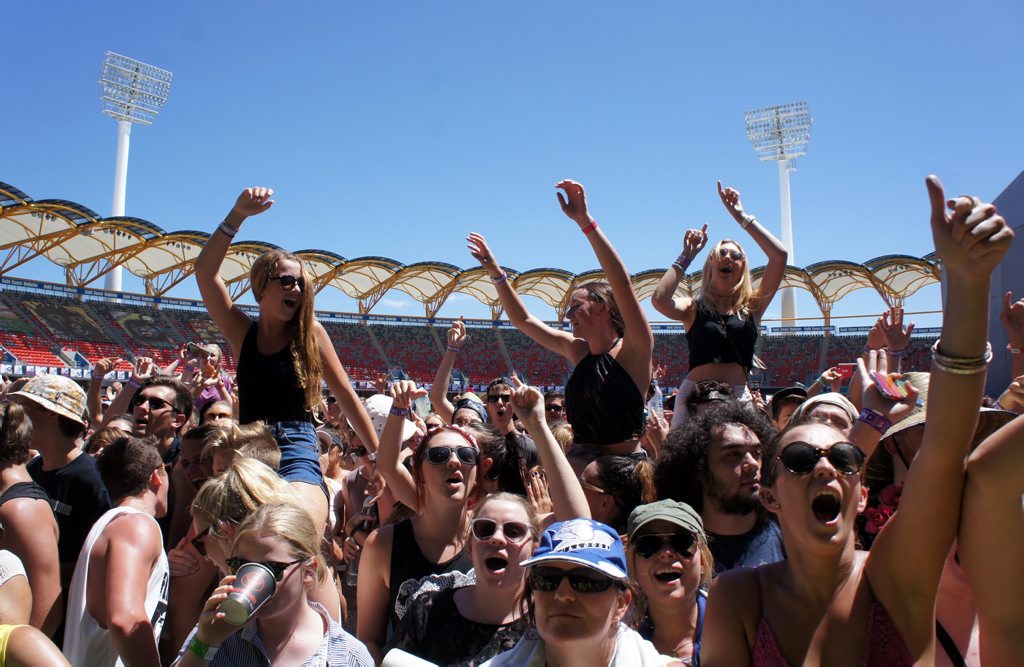 Fans dance to The Naked & Famous's set in Metricon Stadium at the Gold Coast Big Day Out. Fans dance to The Naked & Famous's set in Metricon Stadium at the Gold Coast Big Day Out.