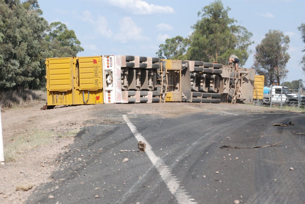 The overturned cattle truck. The overturned cattle truck.