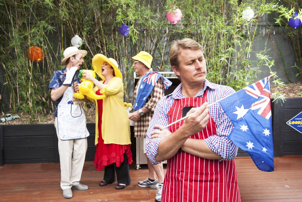 Actor Paul Bishop, front, in a scene from the Queensland Theatre Company's production of the play Australia Day. Supplied by Kath Rose Publicity. Actor Paul Bishop, front, in a scene from the Queensland Theatre Company's production of the play Australia Day. Supplied by Kath Rose Publicity.