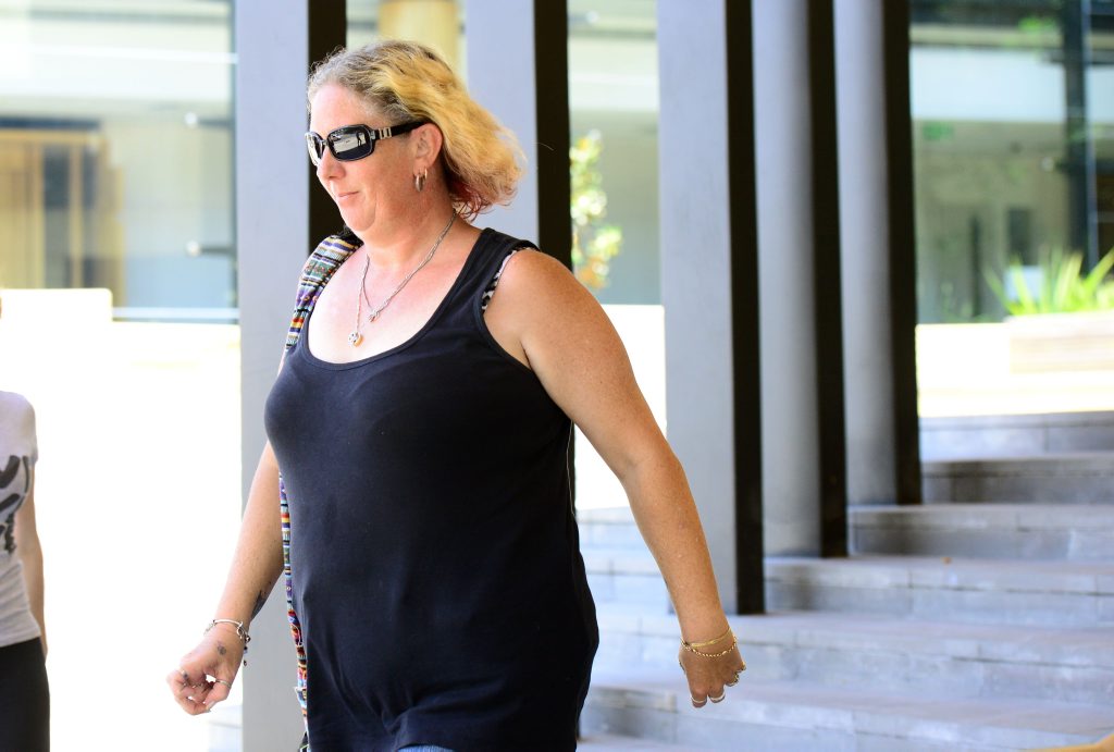 CALLOUS: Debra Louise Pridmore leaves Ipswich Magistrates Court yesterday. CALLOUS: Debra Louise Pridmore leaves Ipswich Magistrates Court yesterday.