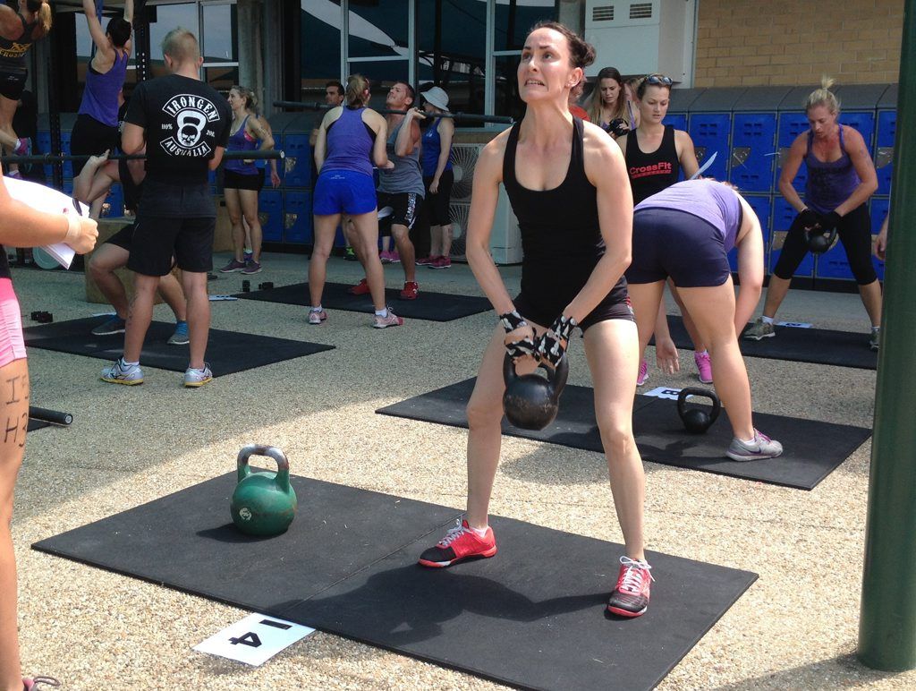 Emma Jeha lifts the kettle bell during Saturday's CrossFit Rockhampton's Aus Day Mashup at The Cathedral College. Photo Kerri-Anne Mesner / Morning Bulletin Emma Jeha lifts the kettle bell during Saturday's CrossFit Rockhampton's Aus Day Mashup at The Cathedral College. Photo Kerri-Anne Mesner / Morning Bulletin