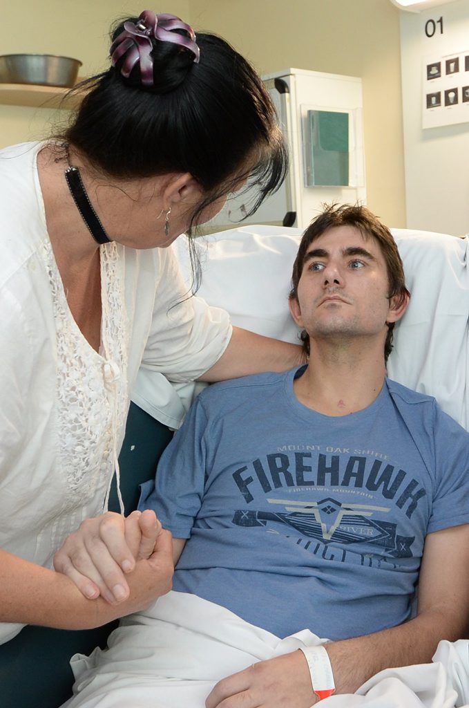 Dedicated mother Daphnejean Finnegan talks with her son Jamie at the Rockhampton Hospital. Photo: Chris Ison / The Morning Bulletin Dedicated mother Daphnejean Finnegan talks with her son Jamie at the Rockhampton Hospital. Photo: Chris Ison / The Morning Bulletin