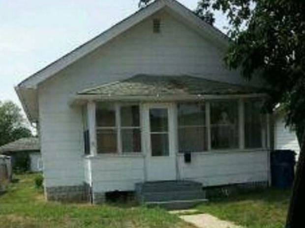 This image via the Hammond Police Department appears to show a figure at the window on the right side of the porch.
This image via the Hammond Police Department appears to show a figure at the window on the right side of the porch.