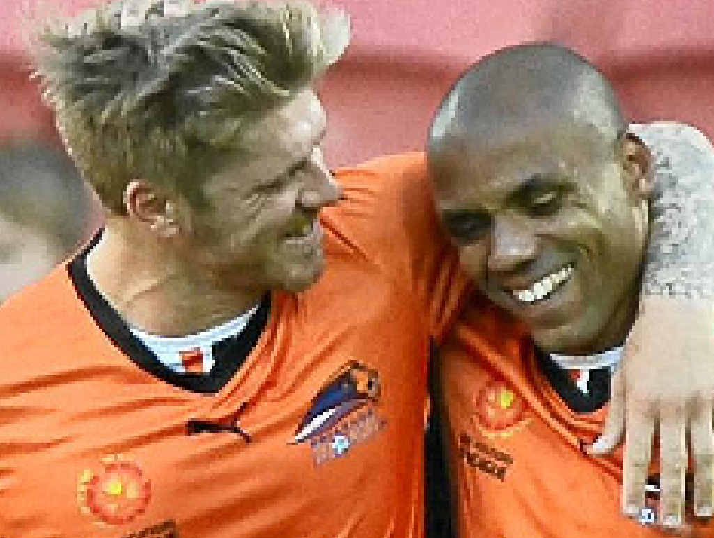 WELL DONE: Luke Brattan (left) gives Henrique a hug after the Brazilian scored the equaliser in yesterday’s 2-1 win over Central Coast Mariners. WELL DONE: Luke Brattan (left) gives Henrique a hug after the Brazilian scored the equaliser in yesterday’s 2-1 win over Central Coast Mariners.