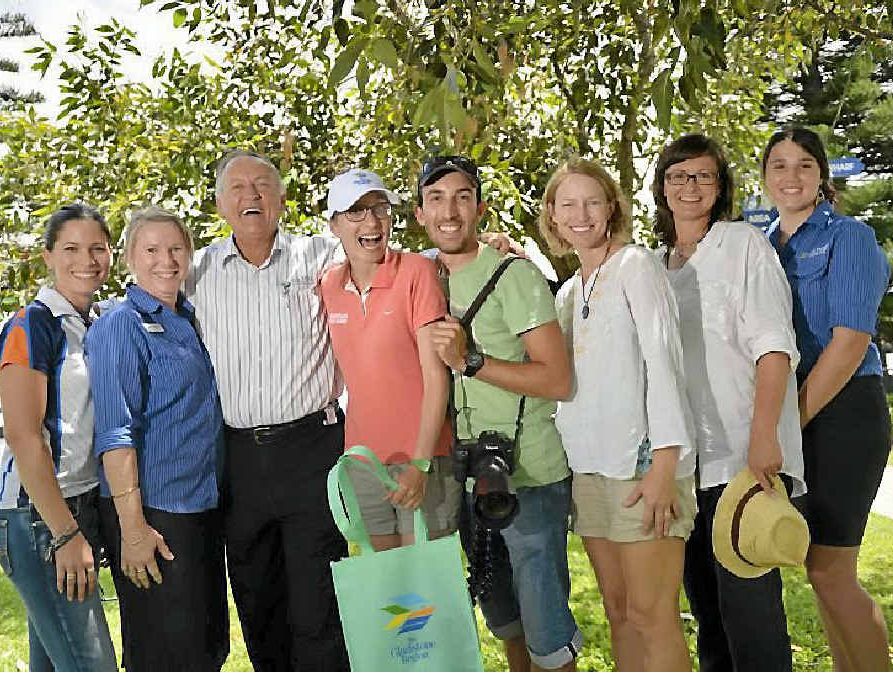 YEAR’S UP: Best Job in the World winner Elisa Detrez (centre), is finishing up the year with more adventure on the horizon. She is pictured with Melissa Dahtler, Lynette Spencer, Glenn Churchill, partner Max Coquard, Kara Murphy, Karen Ronning and Patricia Rizzato.