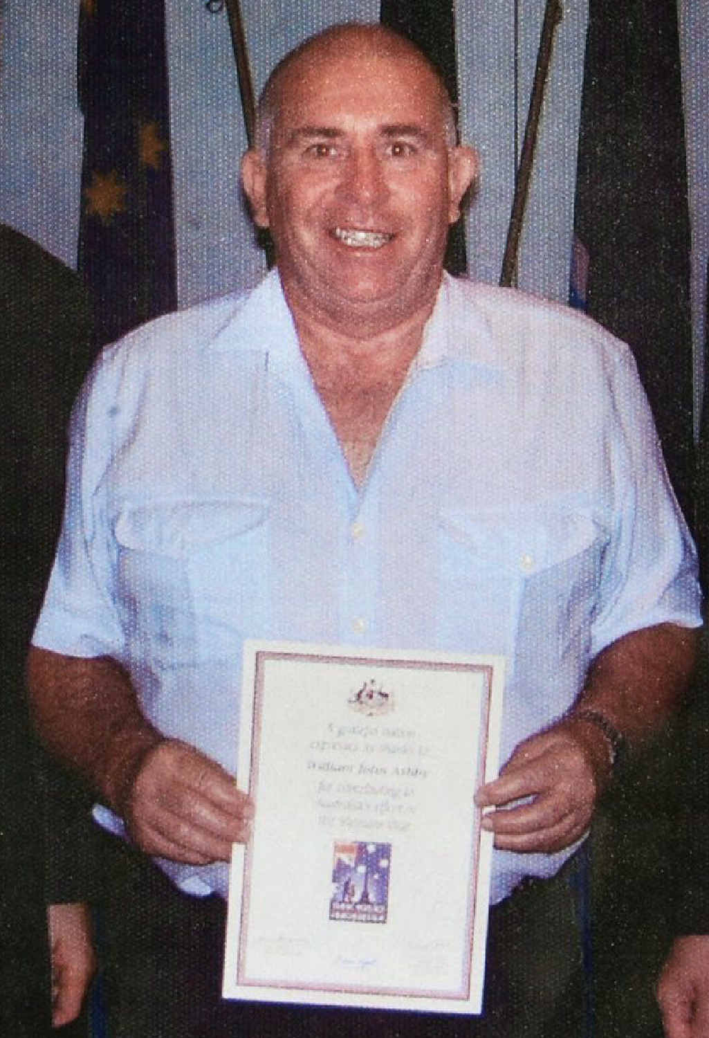PROUD: Neville Irwin receives his Vietnam service appreciation certificate. PROUD: Neville Irwin receives his Vietnam service appreciation certificate.