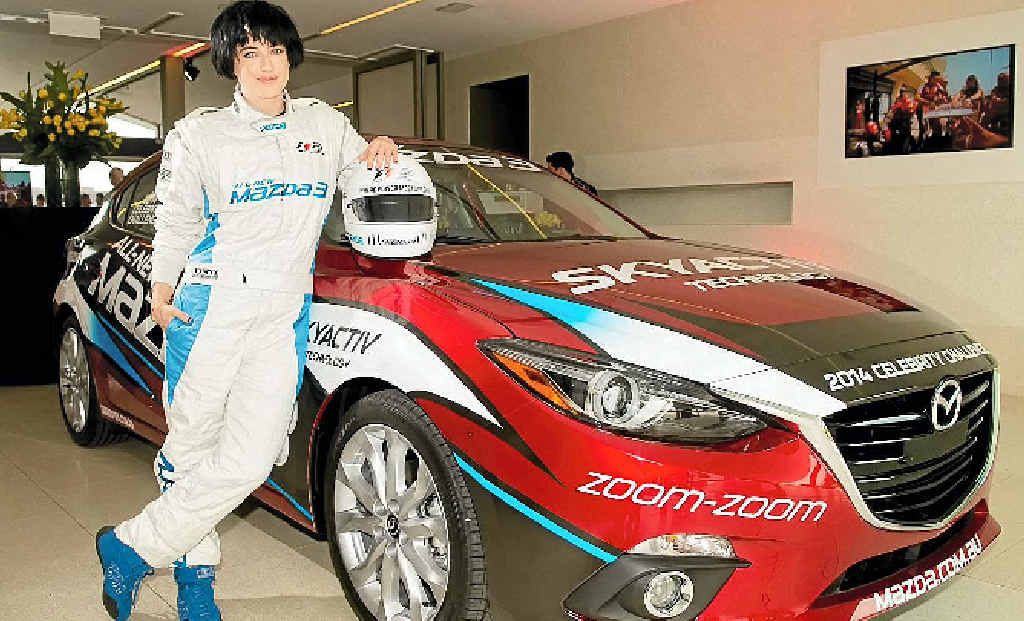 UP FOR THE CHALLENGE: Singer songwriter Megan Washington is suited up for the Mazda3 Celebrity Challenge. UP FOR THE CHALLENGE: Singer songwriter Megan Washington is suited up for the Mazda3 Celebrity Challenge.