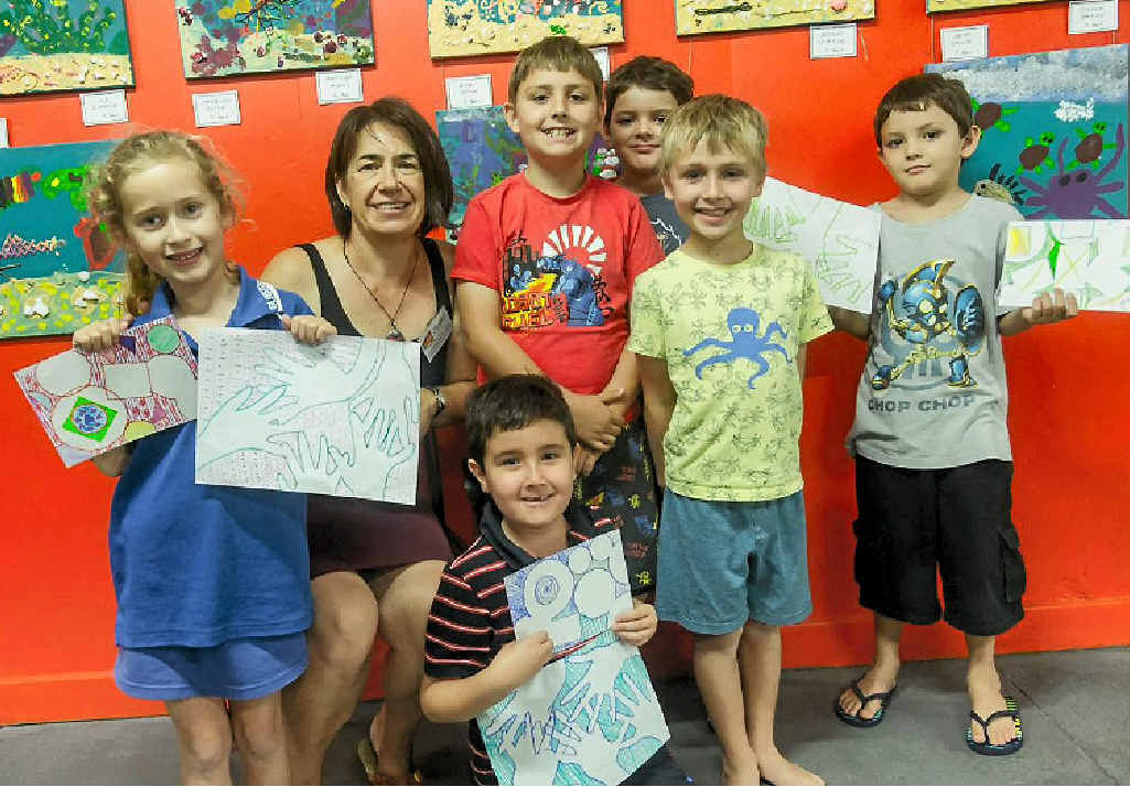 ARTS: Jenny Fournier pictured with children from her after-school art classes. ARTS: Jenny Fournier pictured with children from her after-school art classes.