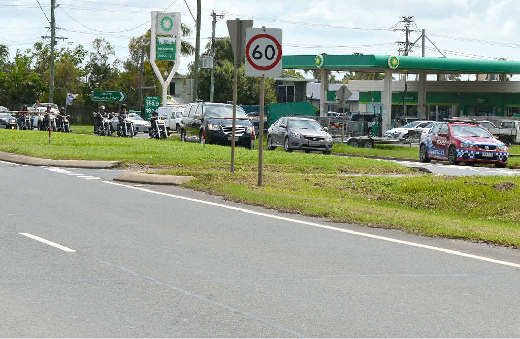 A funeral cortege of motorbike riders passes police on Harbour Rd, heading to the chapel for Rebels member Gregory “Dodgie” Delbridge’s funeral. A funeral cortege of motorbike riders passes police on Harbour Rd, heading to the chapel for Rebels member Gregory “Dodgie” Delbridge’s funeral.