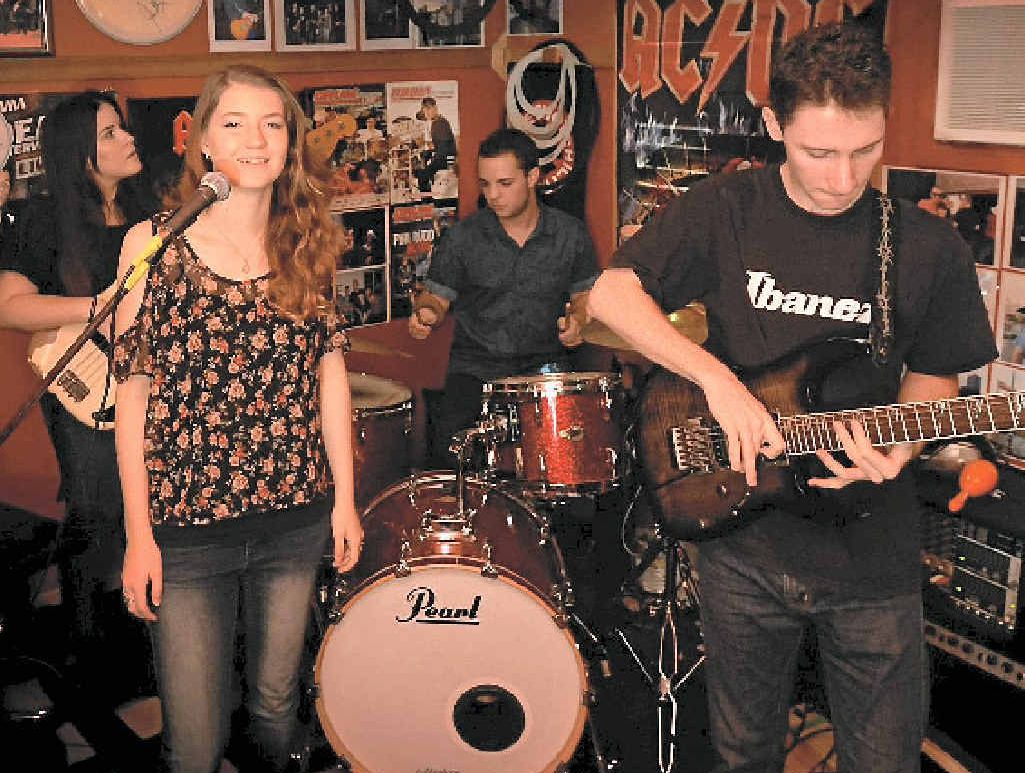 THE BAND: Amelia Kase with Stephanie Quinlan on bass, Logan Brewster on drums and James Gordon on guitar. THE BAND: Amelia Kase with Stephanie Quinlan on bass, Logan Brewster on drums and James Gordon on guitar.