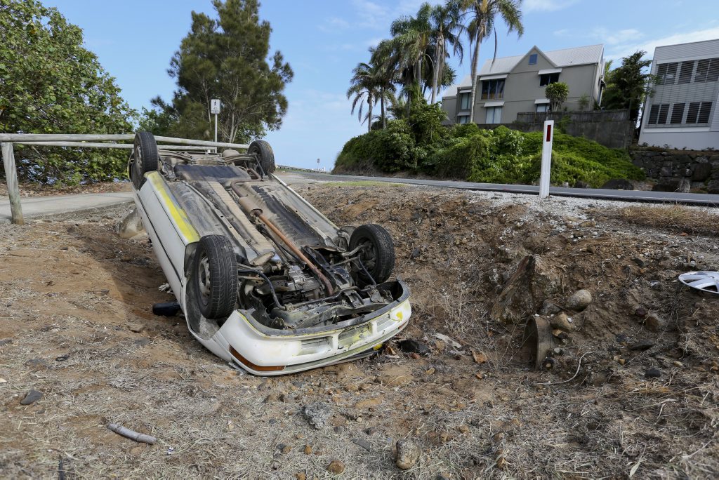 Car flipped over on Fingal rd last night. Photo: Nolan Verheij-Full / Daily News Car flipped over on Fingal rd last night. Photo: Nolan Verheij-Full / Daily News