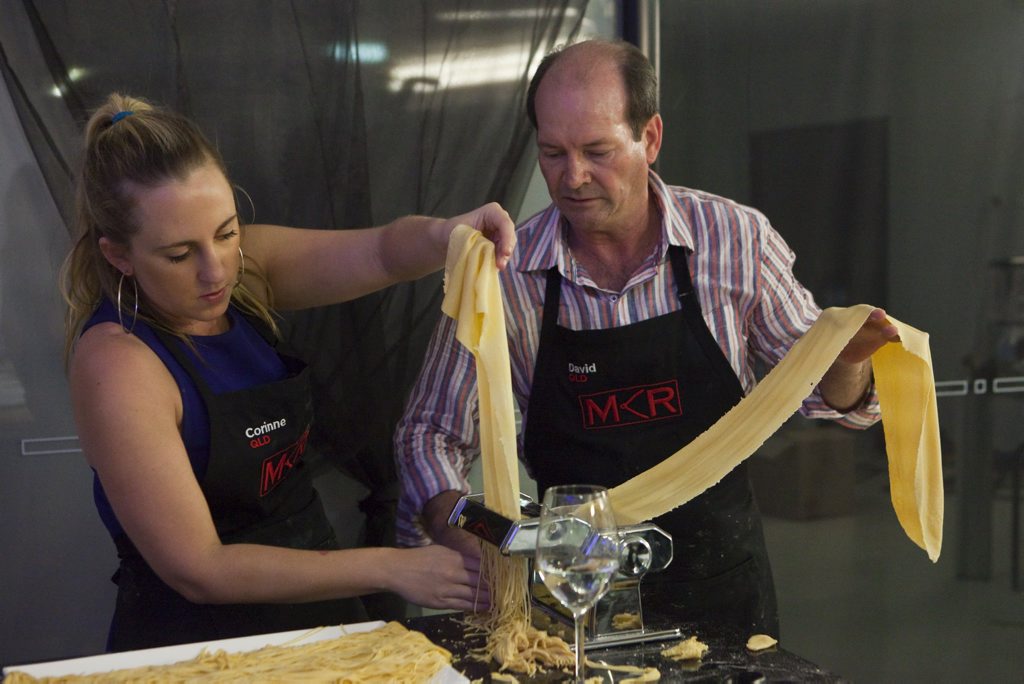 David and Corinne try to fix their angel hair pasta. David and Corinne try to fix their angel hair pasta.