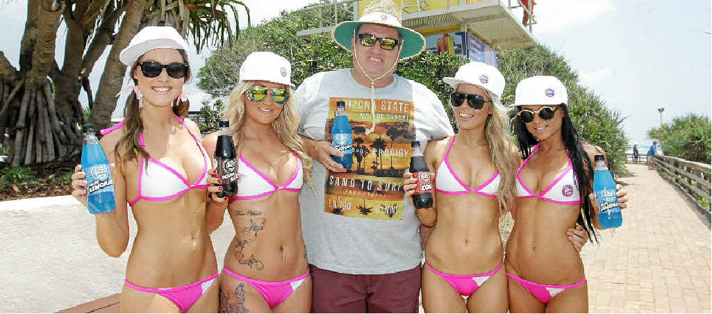 SOFT SELL: The Great Australian Beverage Company CEO Wayne Bettany with promotion girls (from left) Caitlin McVeagh, Sarah Smith, Tara-Lexie Kelly and Dotty Timms at Coolum Surf Club. SOFT SELL: The Great Australian Beverage Company CEO Wayne Bettany with promotion girls (from left) Caitlin McVeagh, Sarah Smith, Tara-Lexie Kelly and Dotty Timms at Coolum Surf Club.